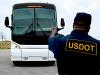 Inspector in front of bus